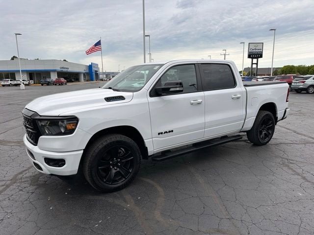 2022 RAM 1500 Big Horn Crew Cab 4x4 5'7" Box in White — front three-quarter view