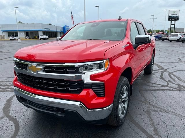 2026 Chevrolet Silverado 1500 LT (2FL) in Red Hot — front three-quarter view